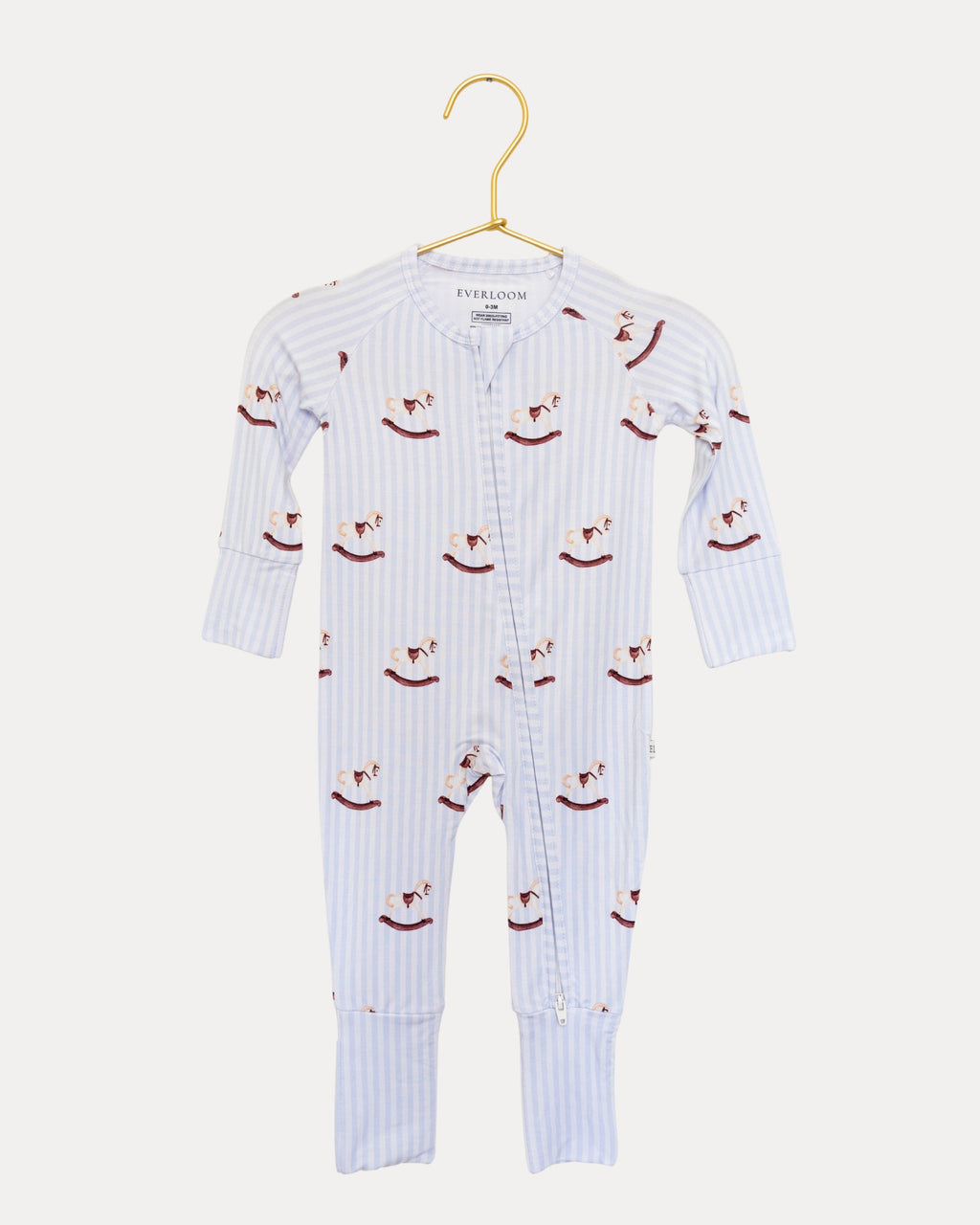Rocking Horse bamboo zip sleeper on a hanger, rocking horses on soft blue stripes
